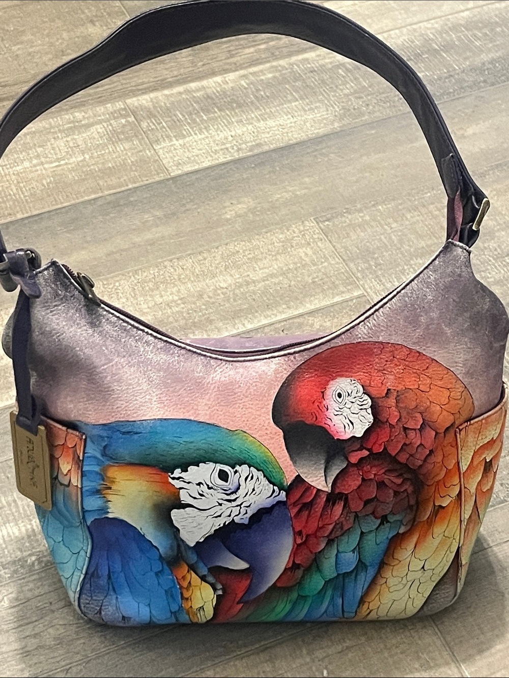 Hand-Painted Multicolor Parrot Shoulder Bag by Anuschka